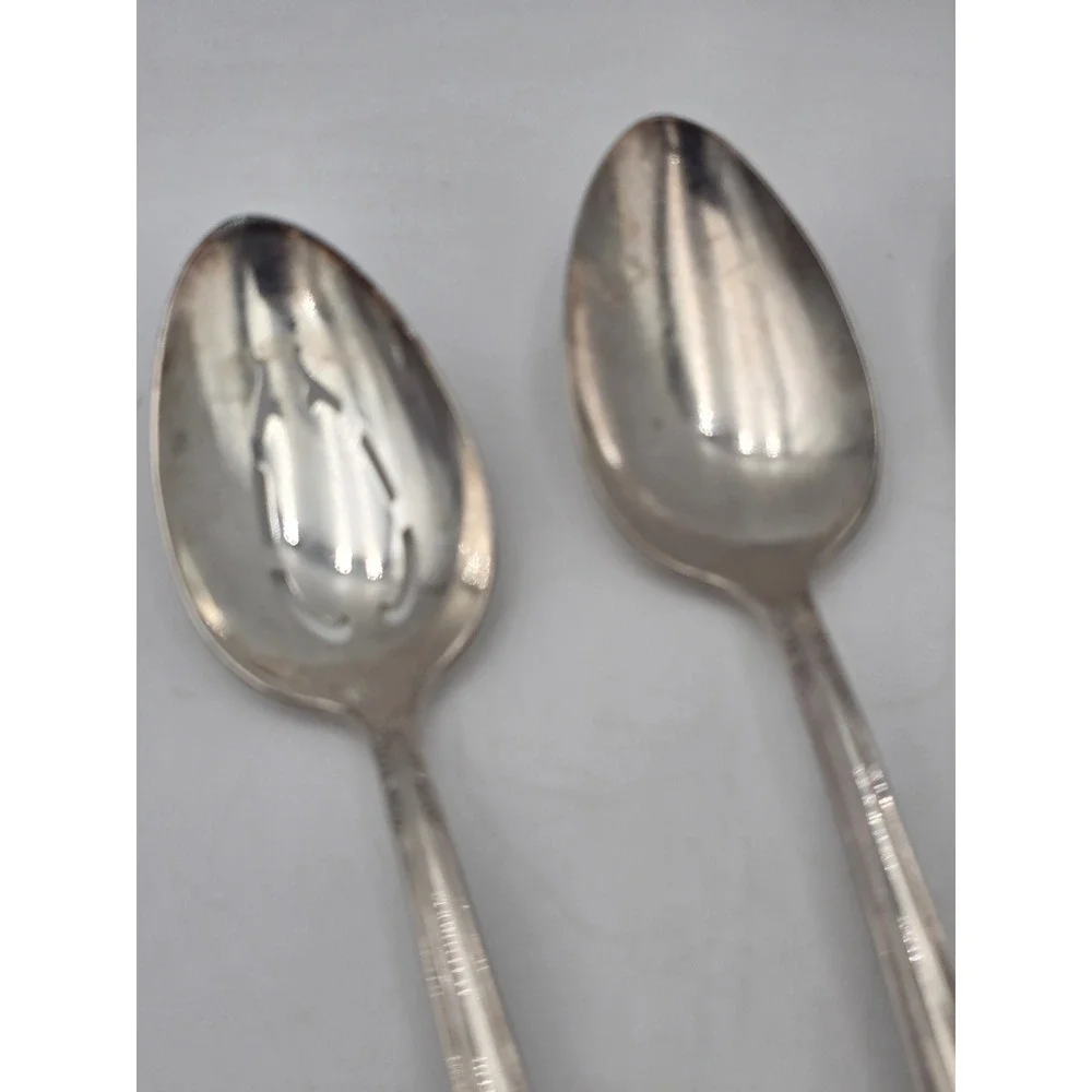 Holmes & Edwards pieces see